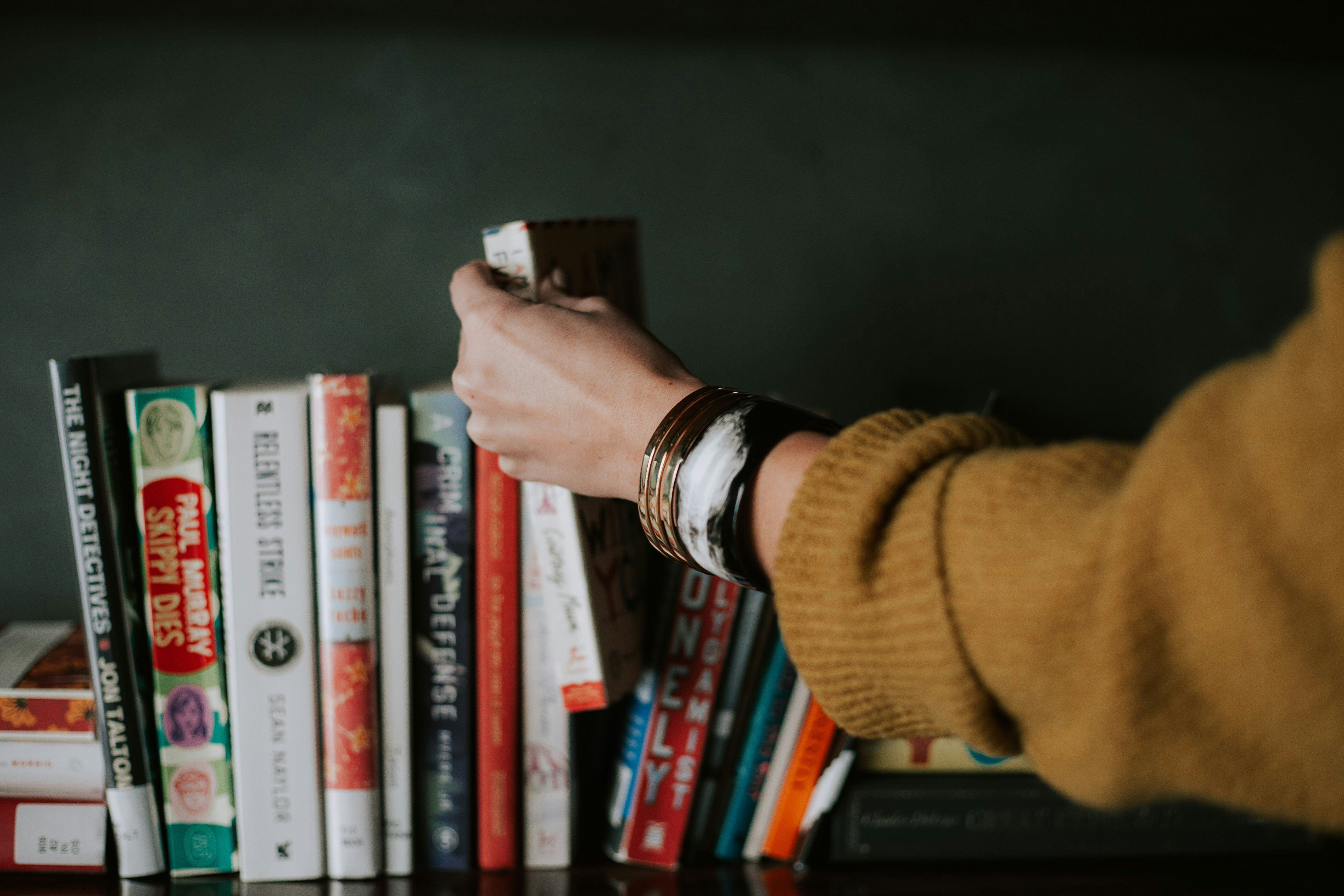 person taking a book