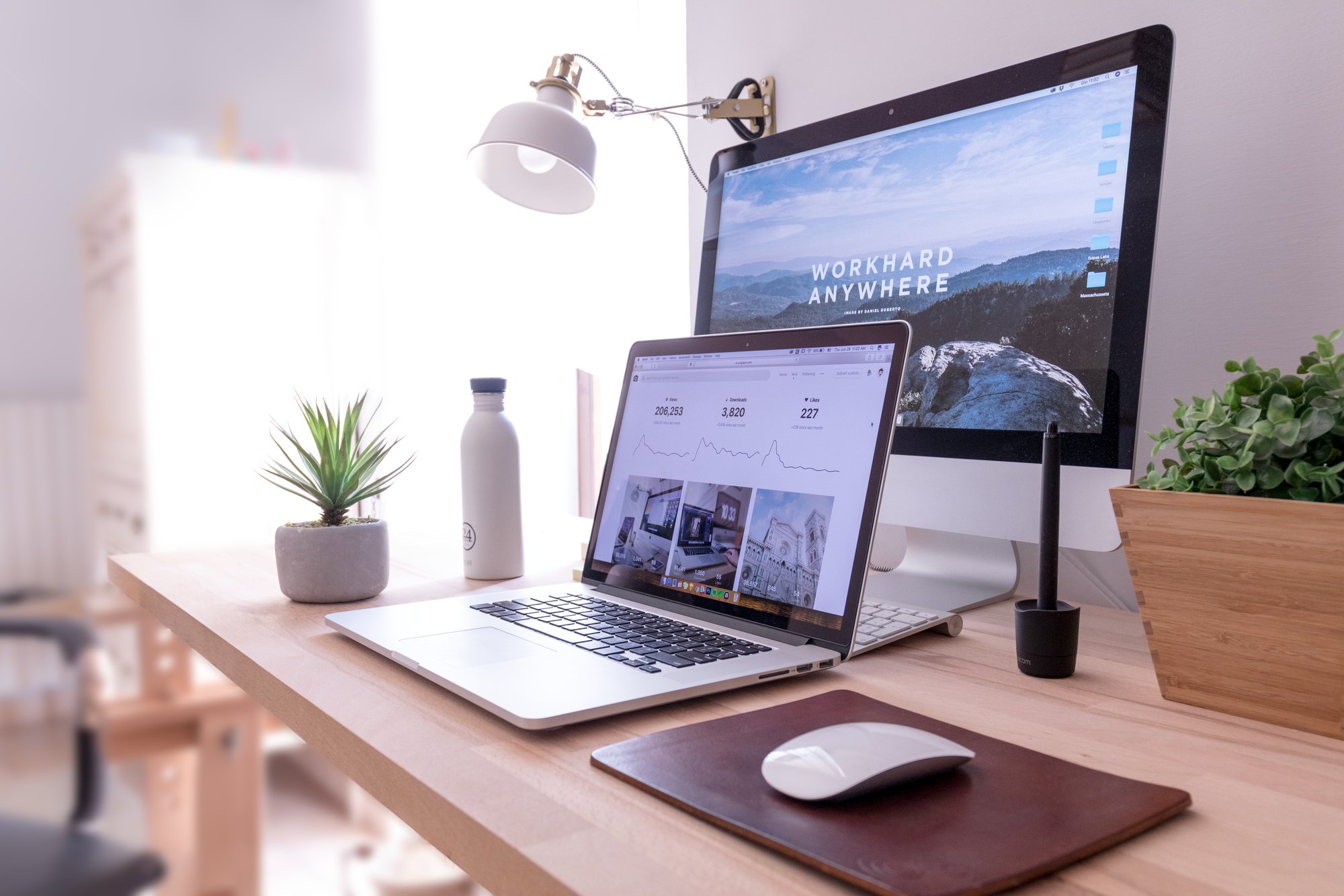 laptop and monitor on a desk